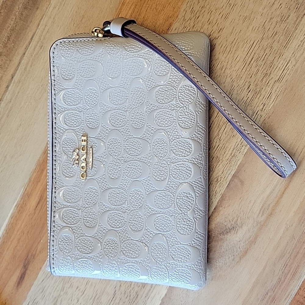 Coach embossed zippered pouch